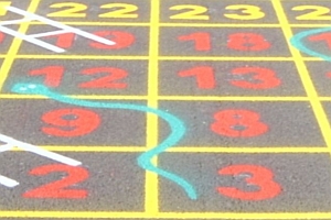 Playground Snakes and Ladders Board Markings Close up